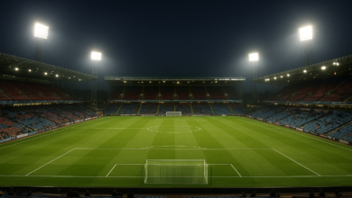 Estádio de futebol iluminado antes de uma partida da Liga Inglesa, sem jogadores identificáveis