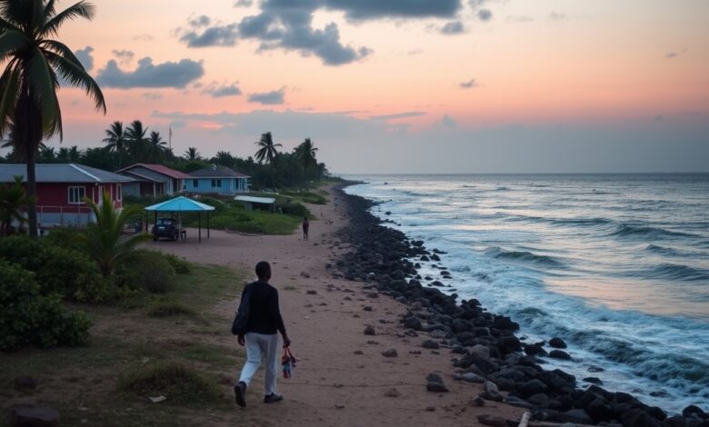 Paisagem costeira de Moçambique com infraestruturas turísticas sustentáveis sob a luz natural do entardecer.