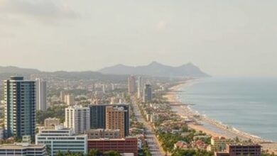 Vista panorâmica costeira e infra-estrutura urbana moderna numa ilha de ambiente sustentável e tecnológico.
