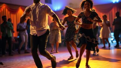 Bailarinos em movimento num palco iluminado durante uma performance de dança contemporânea em ambiente cultural.