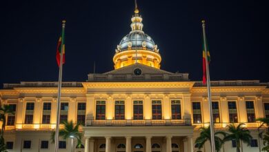 Cúpula de edifício governamental com mastros de bandeiras em plano médio e iluminação suave e sóbria